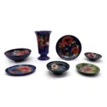 A collection of Moorcroft ‘Anemone’ pattern items,