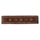 A hand knotted Baluchi runner,