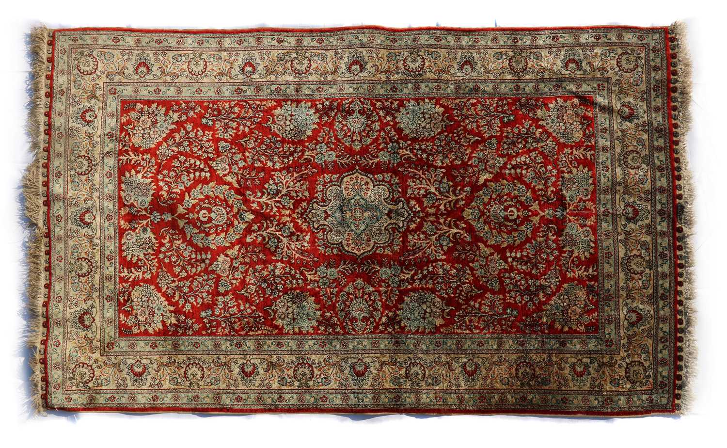 A silk Hereke rug,