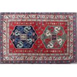 A hand knotted Kazak wool rug