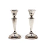 A pair of Elizabeth II silver candlesticks,