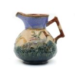 An Arts and Crafts pottery jug,