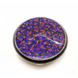 A silver and enamel compact,