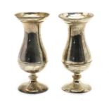A pair of Edwardian silver bud vases