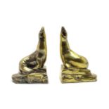 A pair of French silver plated seal bookends,