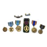 A collection of seven WWII medals,