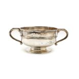 A silver twin handled pedestal bowl