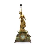 A late Victorian French bronze and green onyx mantel clock lamp,