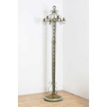 An unusual cut-glass and wrought iron standing candelabrum