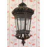 A belle époque hexagonal wrought iron gas lantern,