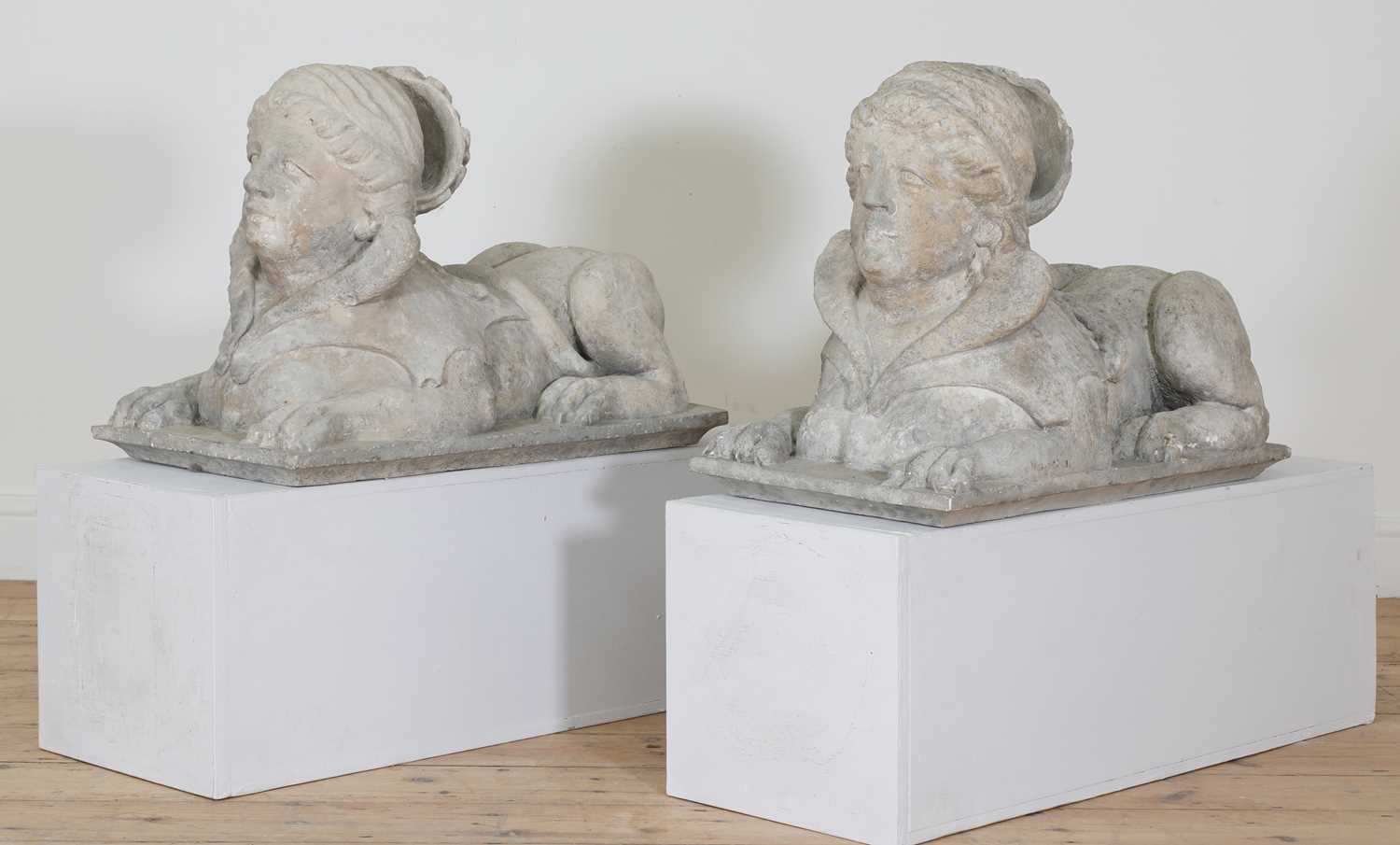 A pair of stone sphinxes,