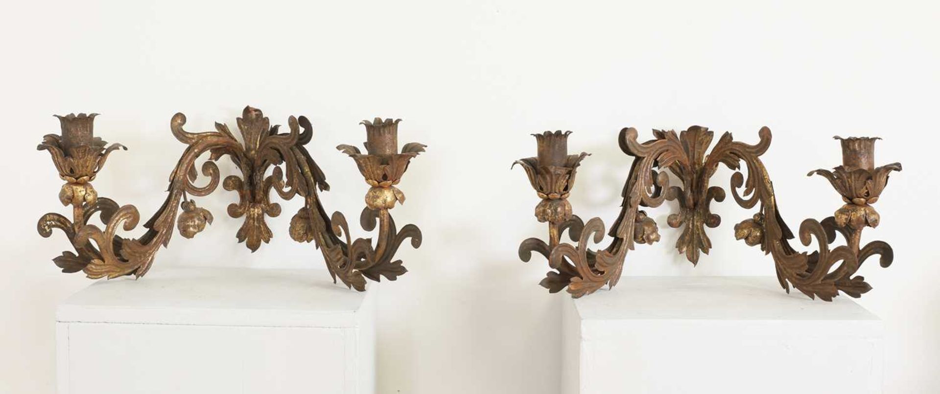 A set of four pressed and gilt-metal twin-branch wall sconces, - Image 3 of 3