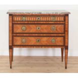 A Louis XVI tulipwood and parquetry commode,