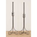 A near pair of wrought iron standard lamps,