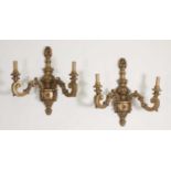 A pair of Edwardian baroque wall lights,