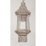 An extraordinary strung shell chandelier,