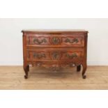 A French provincial fruitwood commode,