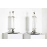 A pair of clear perspex and silvered-metal table lamps,