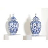 Two pairs of delftware blue and white vases,