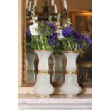 A pair of Baccarat opaline glass vases,