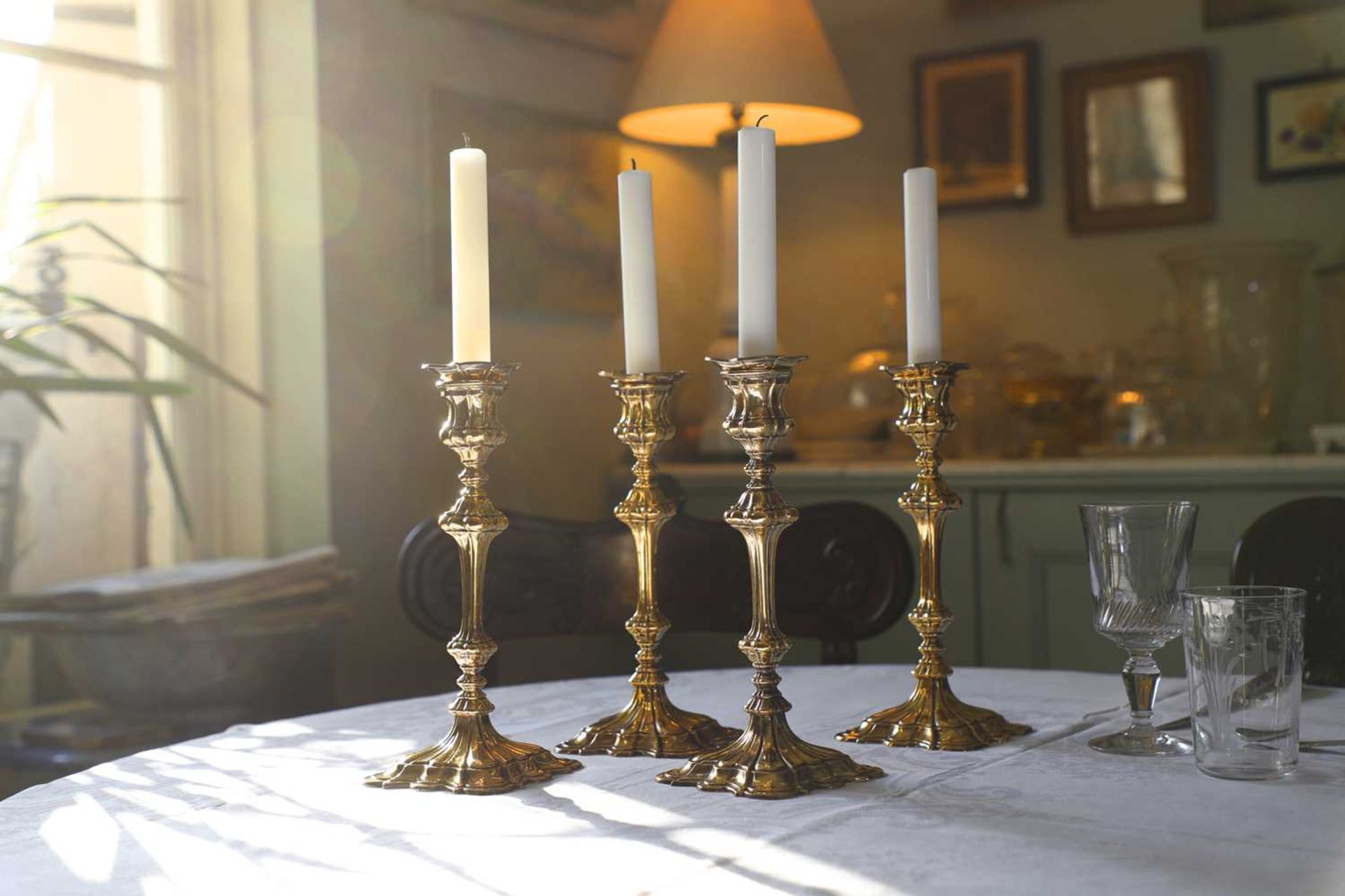 A set of four Elkington & Co. candlesticks,