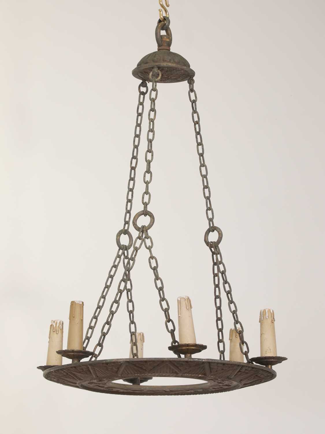 An Edwardian six-light bronze electrolier,