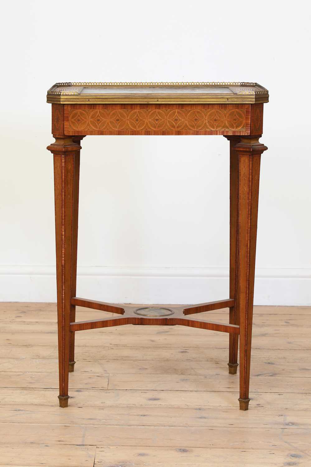 A fine marquetry, lacquered and inlaid table,