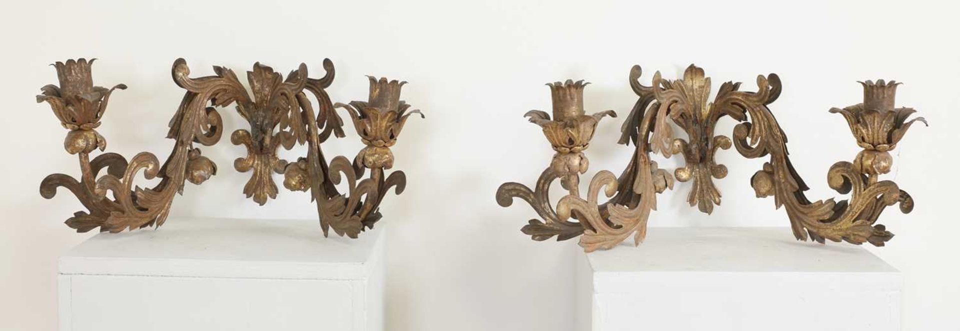 A set of four pressed and gilt-metal twin-branch wall sconces, - Image 2 of 3