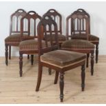 A set of six French Restoration mahogany single chairs,