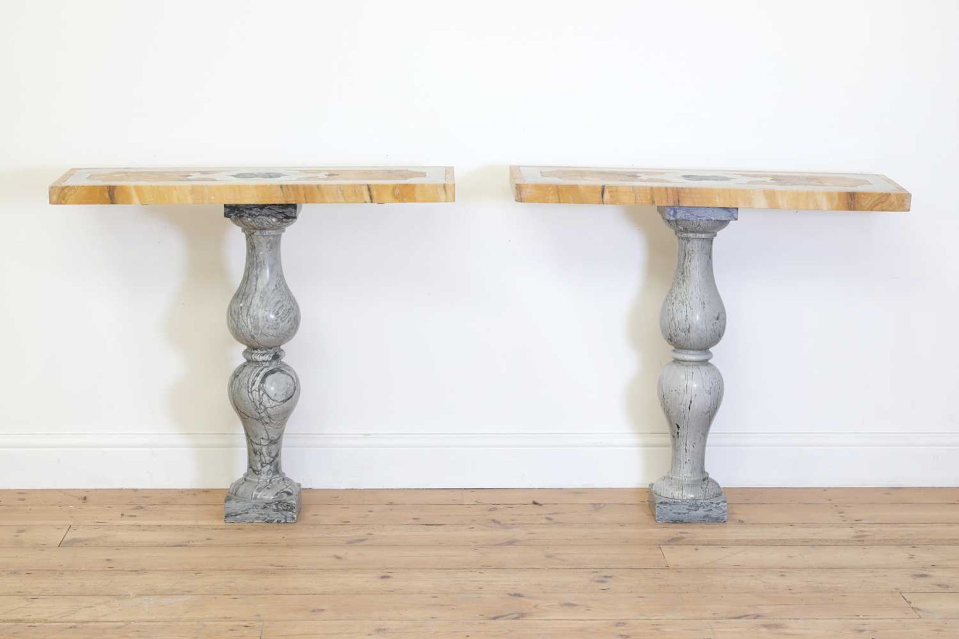A pair of shallow console tables,