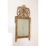 An Italian Empire giltwood wall mirror,