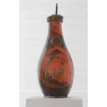 A large red-lacquered porcelain lamp vase,