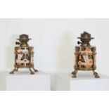 A pair of Arts & Crafts/Aesthetic-style pottery oil lamps,