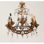 A bronzed wrought iron chandelier,