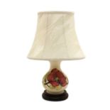 A small Moorcroft pottery 'Anemone' pattern table lamp