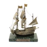 A silver model of The Mayflower,