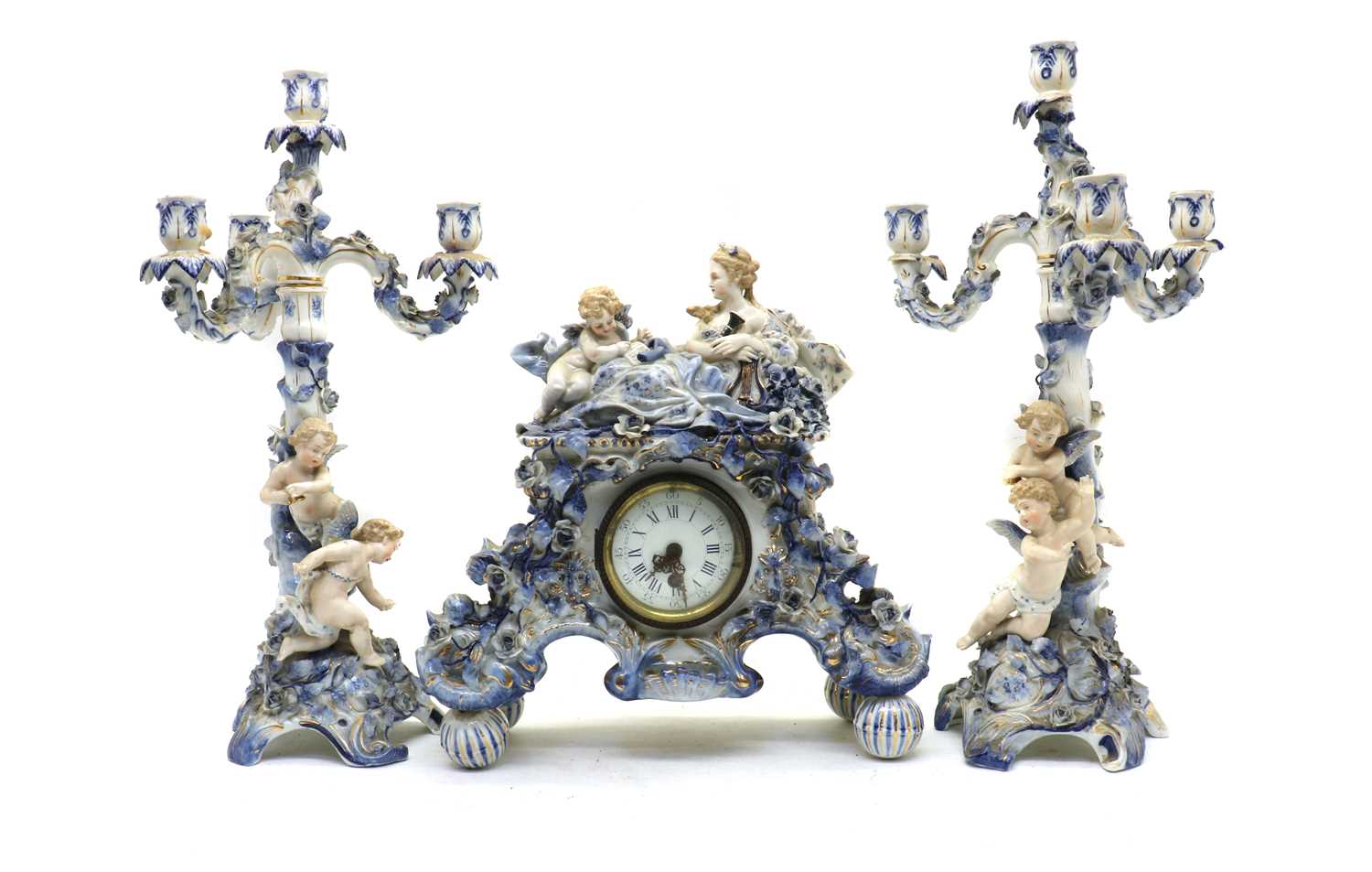 A German porcelain clock garniture