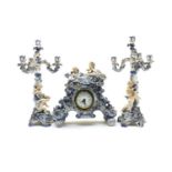 A German porcelain clock garniture