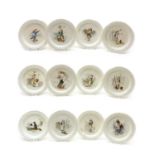 A cased set of twelve Minton creamware nursery plates,