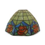 A Tiffany-style leaded coloured glass lamp shade,