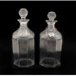 A pair of octagonal Anglo-Irish cut glass decanters,