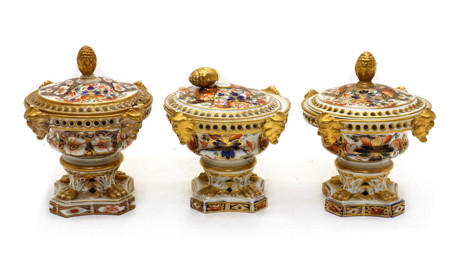 A pair of Derby porcelain pastille burners and covers,