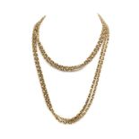 An early 20th century gold long chain,