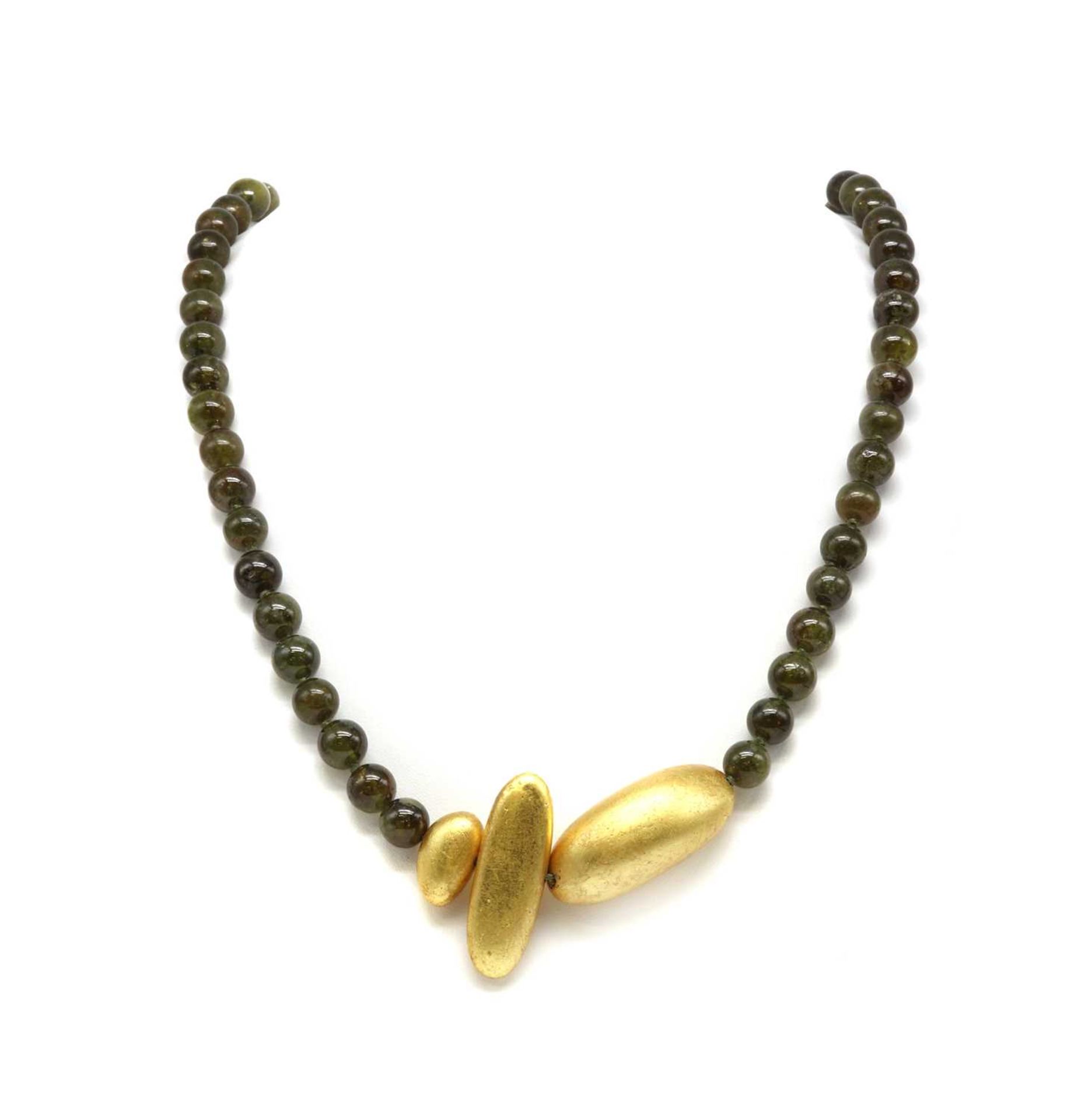 A green grossular garnet bead necklace,