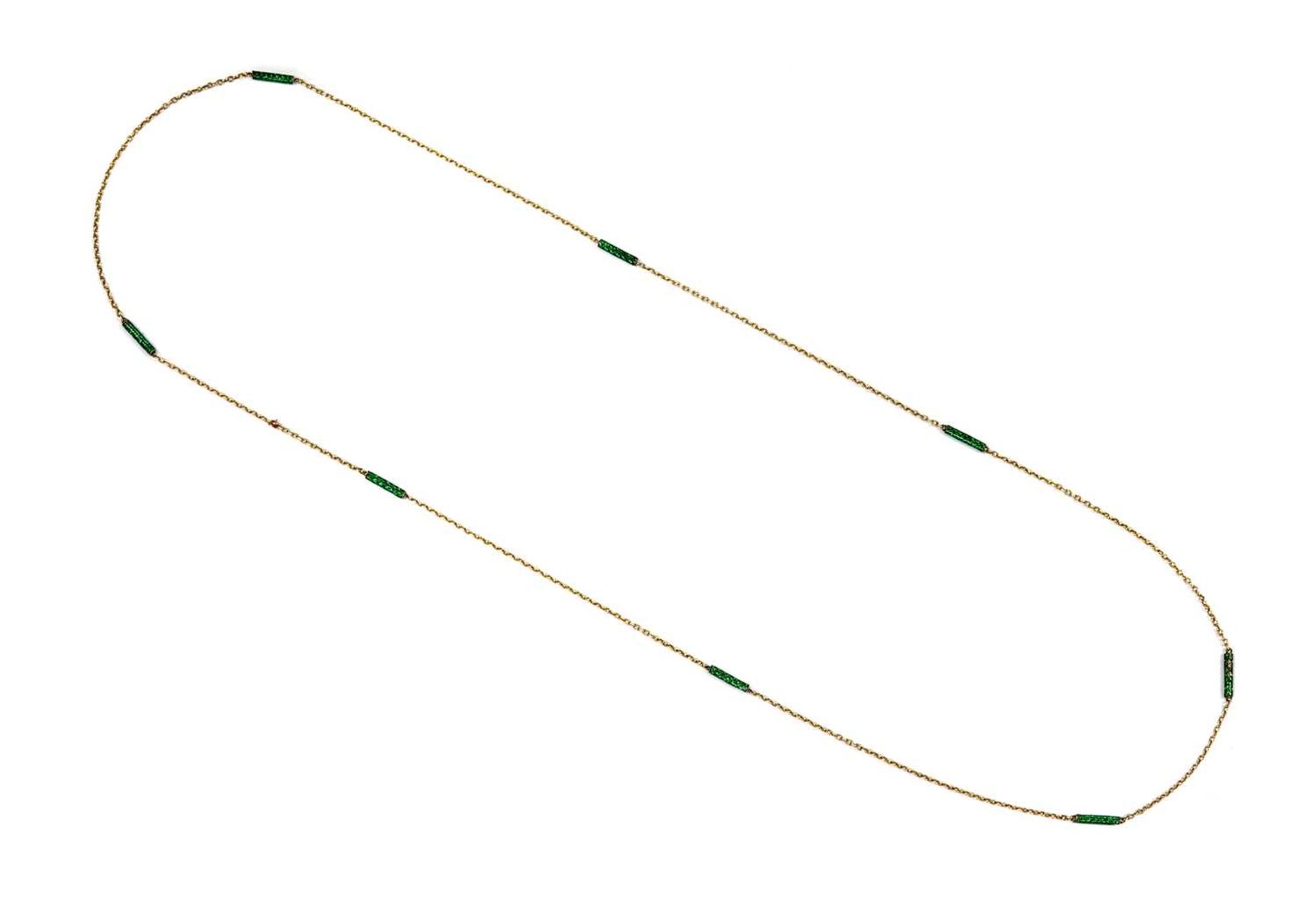 A silver and gold enamel chain,