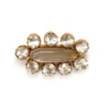 A late 19th century gold moonstone and rock crystal quartz cluster brooch,