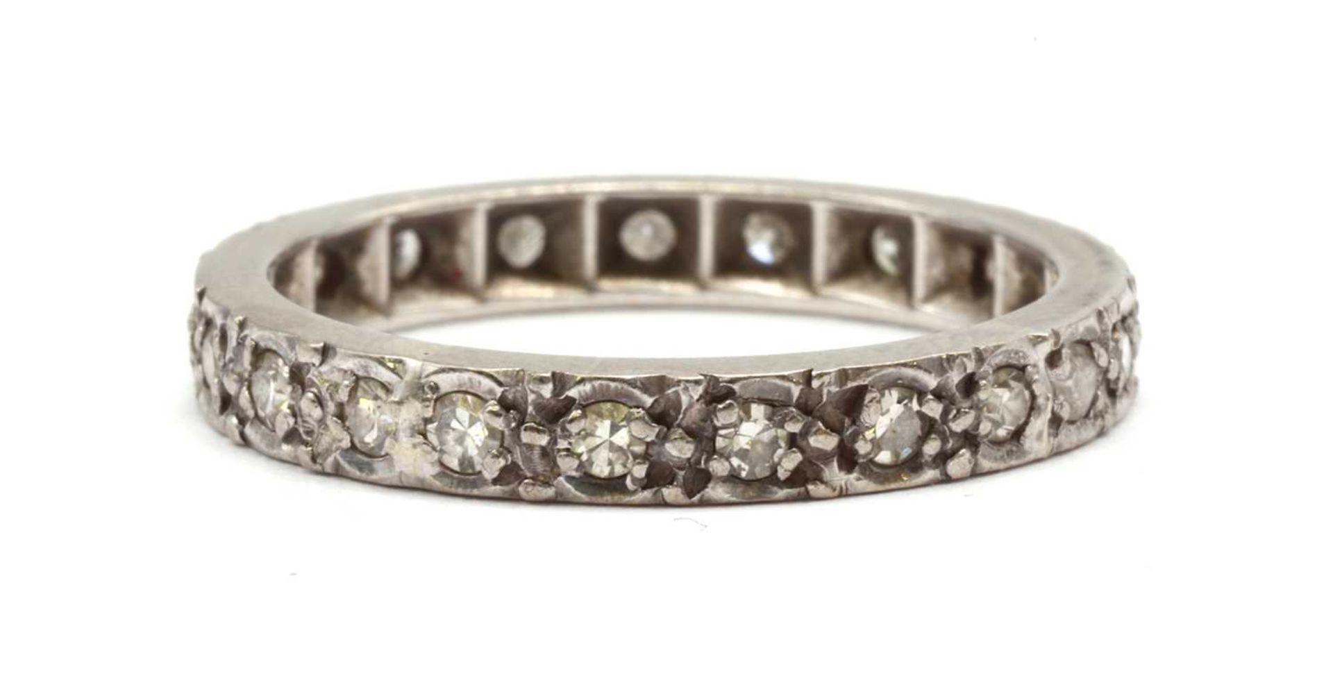 A white gold diamond eternity ring,