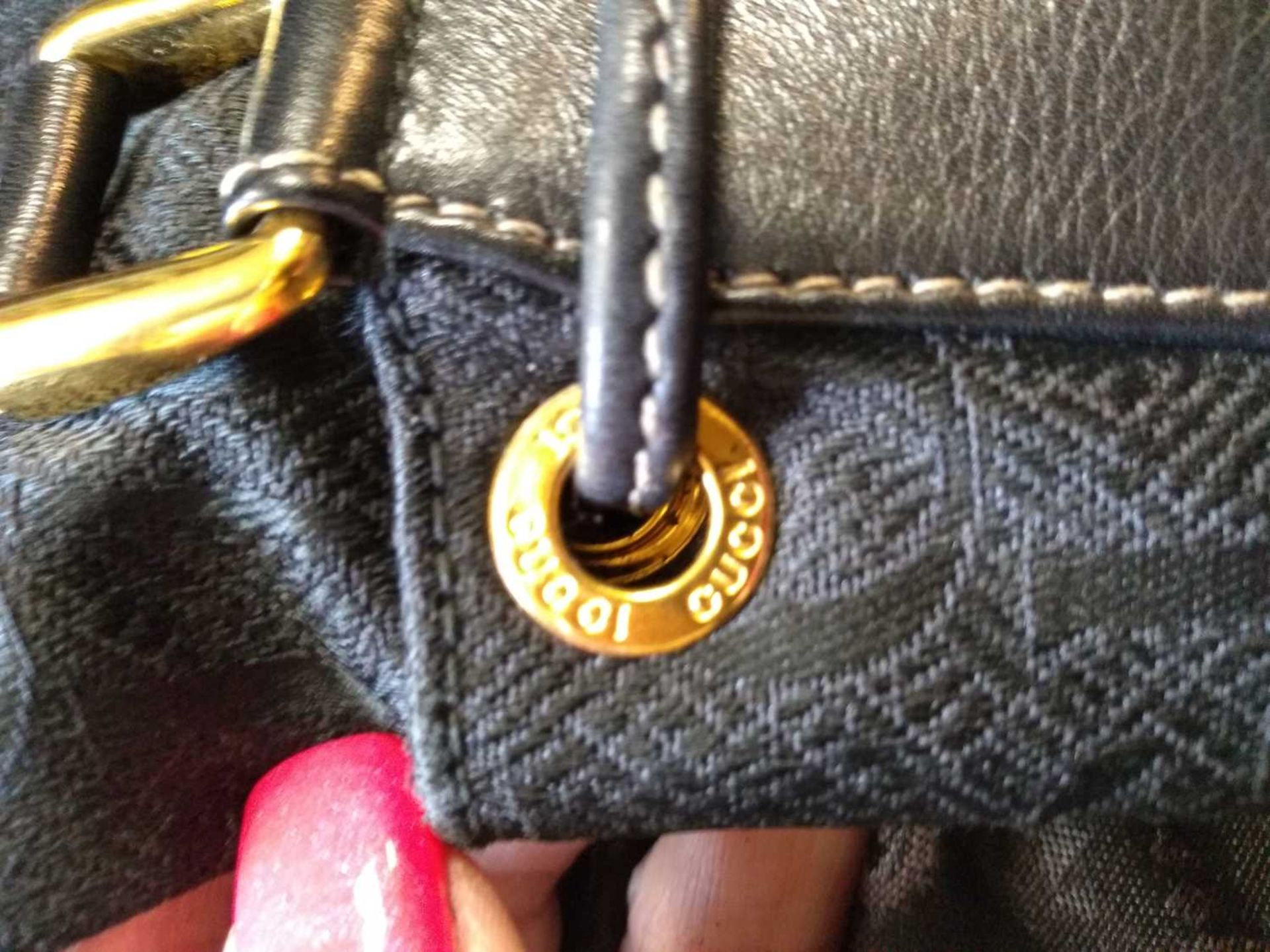 A Gucci black drawstring bucket bag, - Bild 14 aus 16