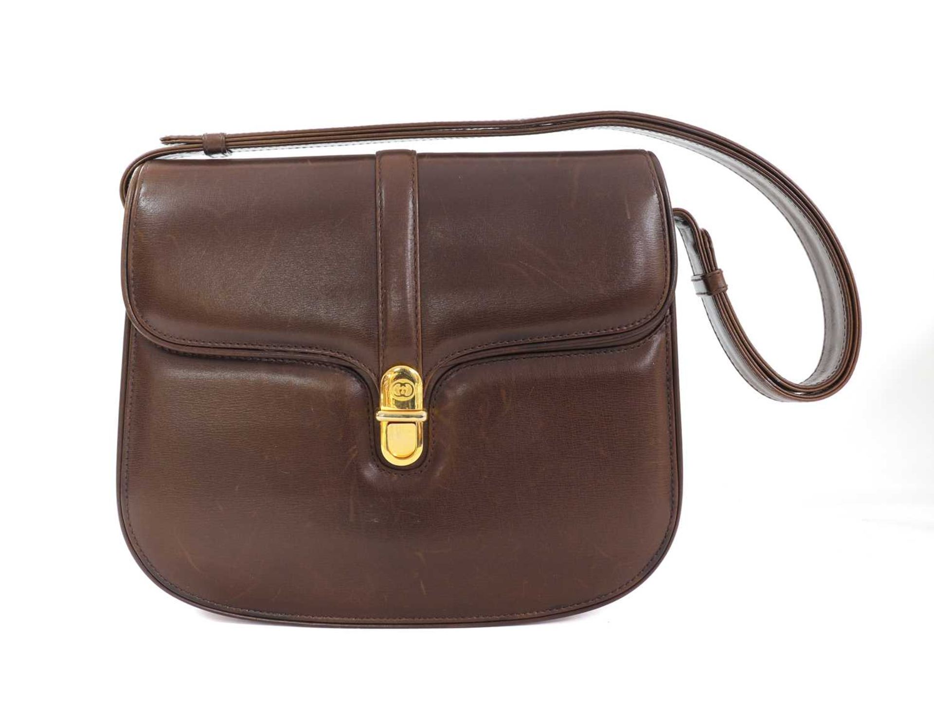 A vintage Gucci brown leather shoulder bag,
