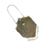 A lowgrade silver mesh purse,